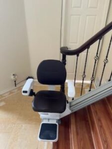 The Pilot Aviator E603 Straight Stairlift with Dark Brown Upholstery Pilot Aviator E603 Brown Upholstery