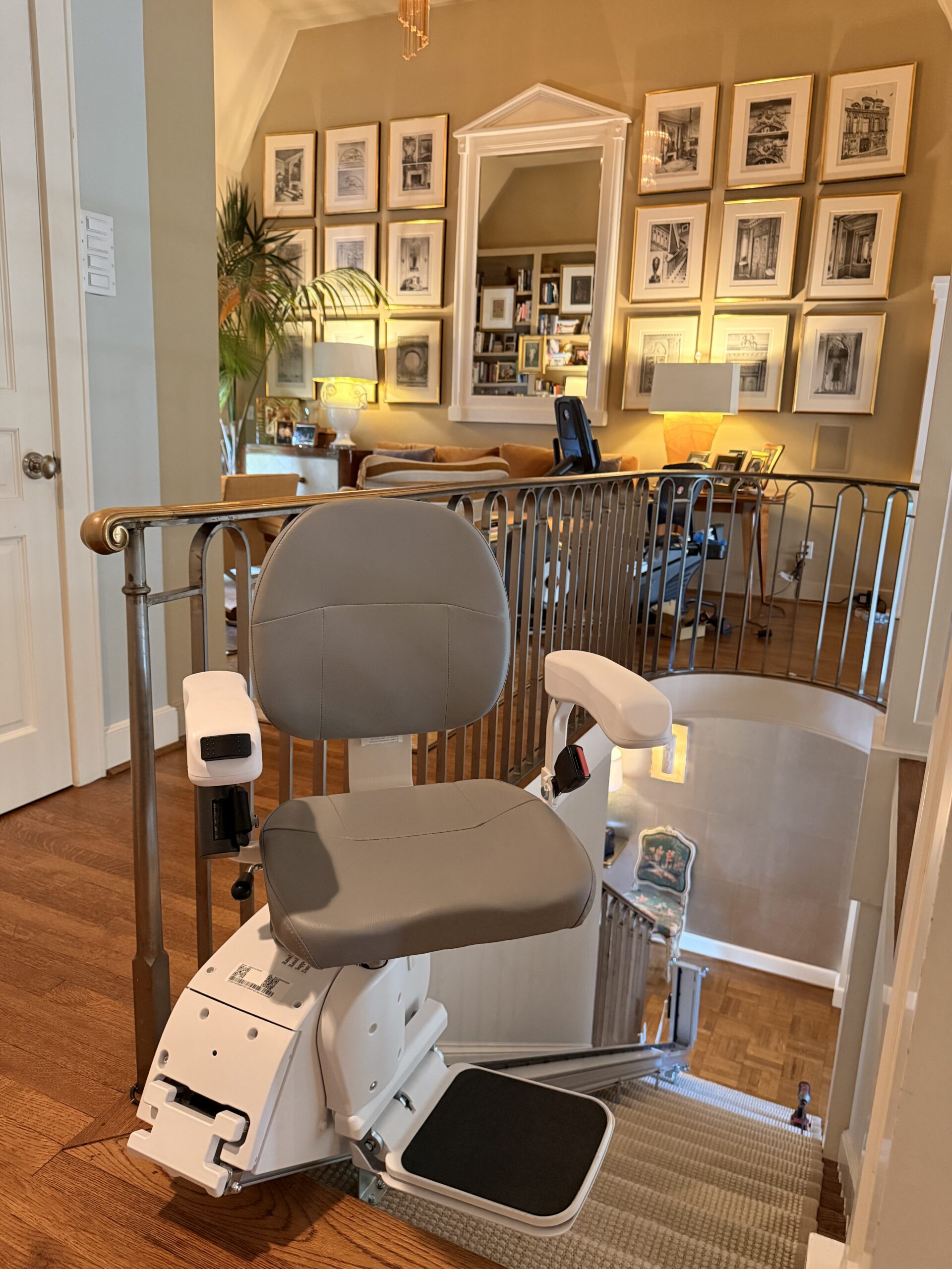 The Pilot Aviator E603 Straight Stairlift with Dark Brown Upholstery in 45° swivel position
